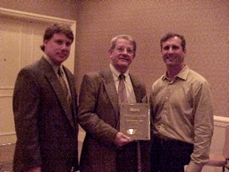 Joe Harlow, CTO, Travis County-Information and Telecommunications Systems is honored as Austin's IT Executive of the Year (Public Sector) by AITP President Scott Calvin and award sponsor Momentum Software