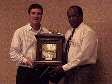 John Ciulla, CIO, Vignette, receives his IT Executive of the Year award from AMD CIO, Fred Mapp